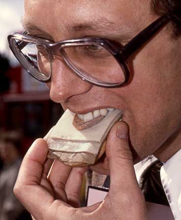 PICTURE: color closeup photo of Gibson posing with the meat hors d'oeuvre in his mouth